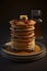 Stack of hot pancakes, butter and syrup. Generative AI