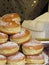 Stack of italian doughnuts with icing sugar