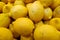 Stack of lemons on a market stall