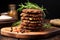 stack of lentil patties on a wooden board