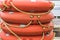 Stack lifebuoy orange lying on the deck of the ferry, boat, ship