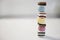 Stack of liquorice sweets on white background