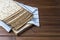 Stack of matzah or matza on a wooden  table