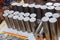 A stack of metal ingots are cut for further processing on a milling machine.