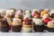 stack of mini cupcakes in assorted flavors and designs