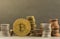 Stack of money and cryptocurrencies bitcoin, ethereum