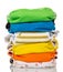 Stack of multi-colored modern eco-friendly diapers is isolated o