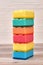 Stack of multicolored kitchen sponges.