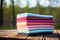 stack of multicolored yoga mats in a serene setting