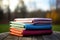 stack of multicolored yoga mats in a serene setting