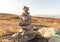 Stack of natural irregular stones in grassland