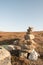 Stack of natural irregular stones in grassland