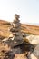 Stack of natural irregular stones in grassland