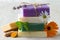 Stack of natural soaps with medicinal plants, flowers and turmeric