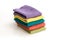 Stack of neatly folded colorful kitchen towels