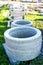 A stack of new concrete rings