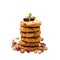 Stack of oat cookies with cranberry and pistachio isolated on w