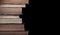 Stack of old books isolated on black