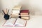 Stack of old books, textbook and pencils in office background for education concept