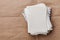 Stack of old envelopes and letters on kraft paper, top view