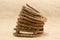 Stack of old retro horse shoes on linen background