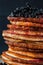 Stack of pancakes with blueberries close-up