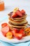 Stack pancakes with fresh fruits