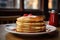 A stack of pancakes placed on a plate