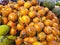 Stack of passion fruit being sold on fresh fruit market. Passion fruit is exotic fruit rich in vitamins and antioxidant