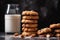 A stack of peanut butter cookies with a glass of milk