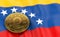 Stack of Petro concept coins on Venezuelan flag. Situation of Petro the cryptocurrency of Venezuela concept. 3D Rendering