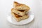 Stack pieces of pie with chicken filling in plate on table