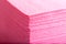 Stack of pink paper table napkins