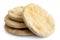 A stack of pita breads isolated on white from above.