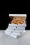 Stack of pizza box with pizza inside. pizza delivery. box on black background. meat pizza