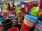 Stack of plastic bucket being displayed in a supermarket