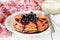 A Stack of Pumpkin Pancakes Topped with Chokeberry Preserves, copy space for your text
