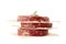 Stack of raw beef burger patties on white