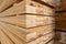 Stack of raw wood, Lumber warehouse storage wooden. Timber goods storehouse. wood import-export industry