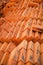 Stack of red new bricks nicely arranged at the construction site