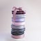 A stack of reels with multi-colored reps ribbons for decoration and packaging of gifts and bouquets with bow