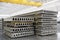 Stack of reinforced concrete slabs in a factory workshop