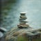 Stack of Rocks Balanced on Top of a Rock