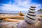 Stack of Rocks on Driftwood