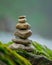 Stack of Rocks on Mossy Stone