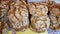 Stack of round rustic bread rolls in a portuguese market. Tasty meal