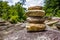 Stack of round smooth stones near mountain river