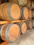 Stack of round wooden wine barrels
