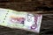 Stack of Saudi Arabia 5 SAR five Saudi riyals cash money banknote with the photo of king Salman Bin AbdulAziz Al Saud
