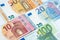 Stack of several euro banknotes money background.